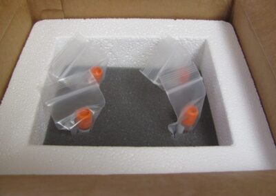 a styrofoam box with plastic bags inside