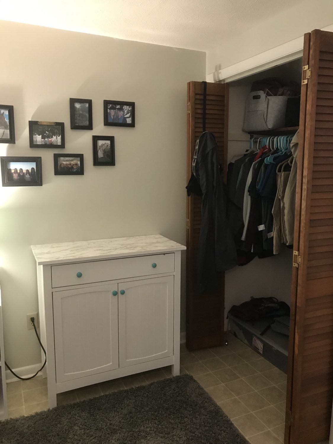 a closet with clothes on it